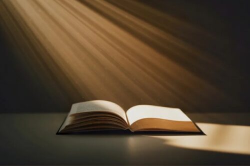Bible with Light Beam - First Lutheran Church